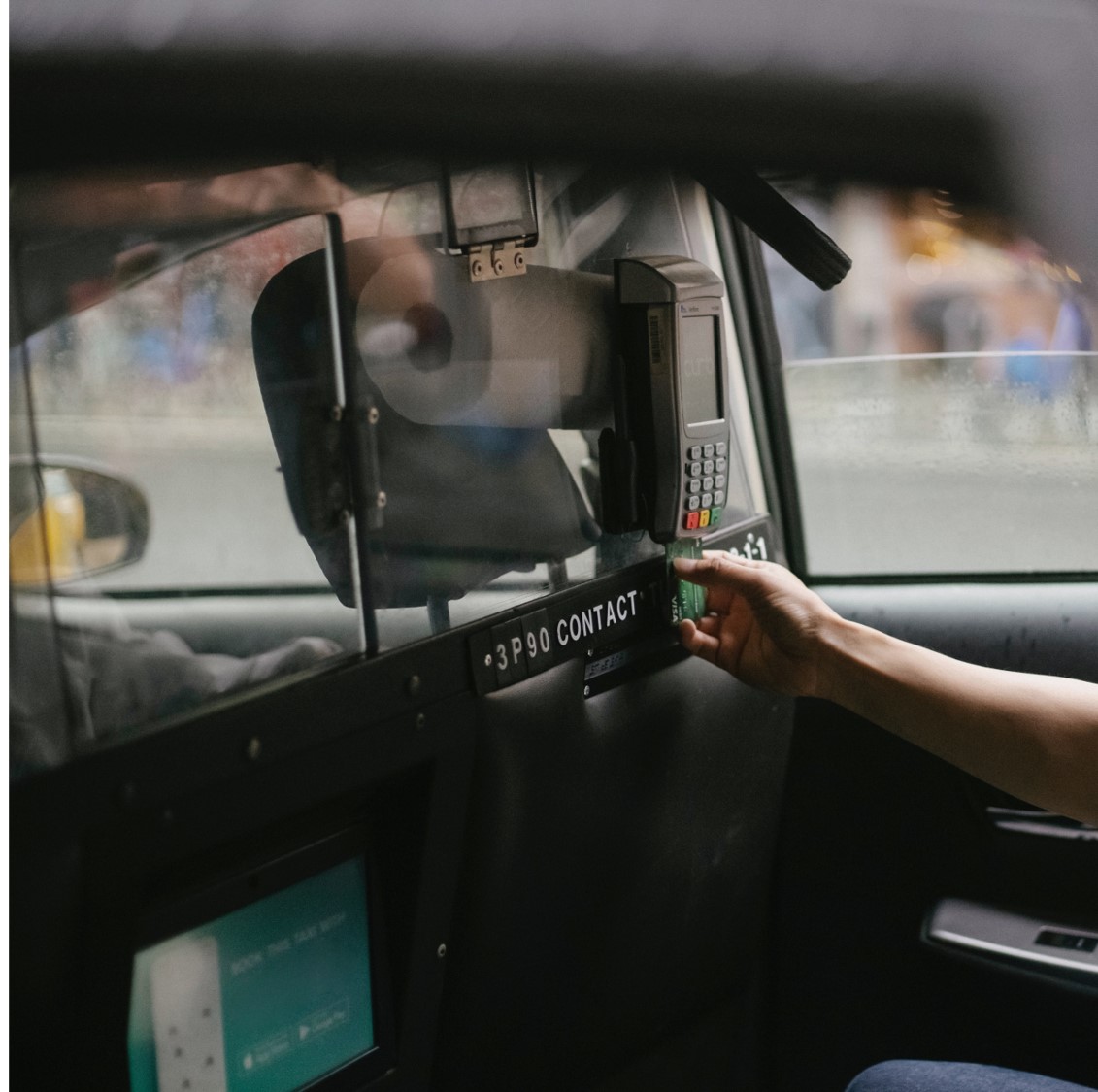 Payment processing machine in a taxi