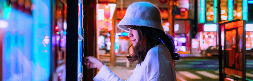 Woman using smart vending machine